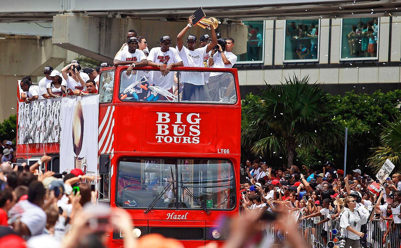 sportingnewsarchive:  HEAT PARADE In the first image,  NBA champion Miami Heat small