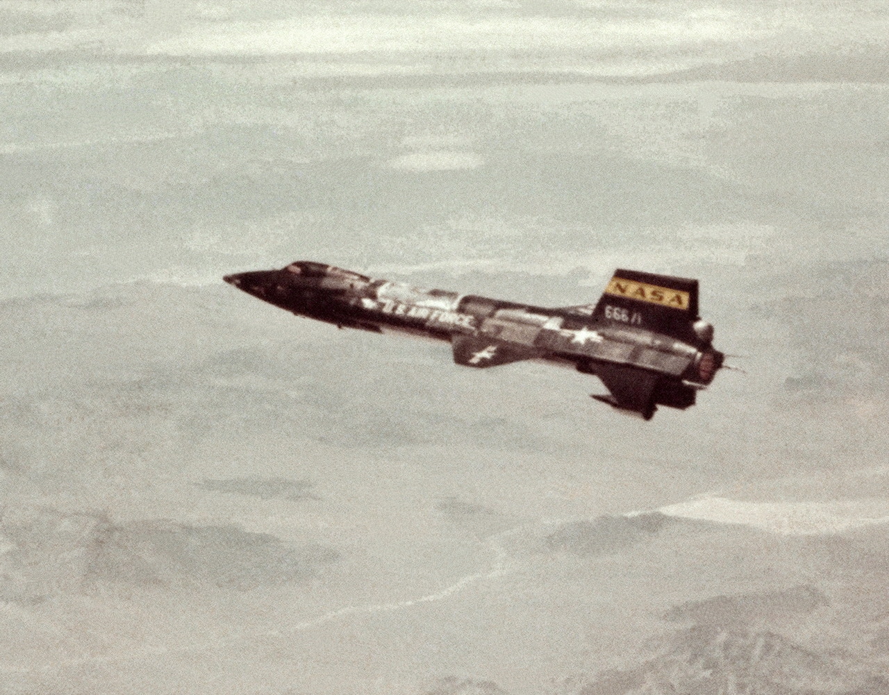 humanoidhistory:  X-15 on a research flight with a dummy ramjet engine attached to