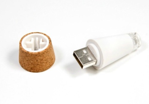 wickedclothes:  Rechargeable Bottle Lamp Some people collect liquor bottles. Others collect glass soda bottles. Whatever your collection consists of, this rechargeable light will turn your bottles into lamps. A USB light is attached to a cork, which is