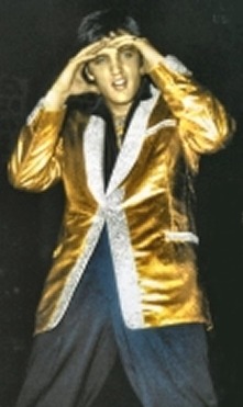ilovetheking-elvispresley:  Random photo’s of Elvis with his gold suit :) 