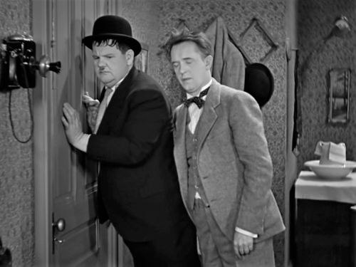 Laurel & Hardy in 1932′s “Their First Mistake”.(1 of 3) Ollie is married and Stan lives across t