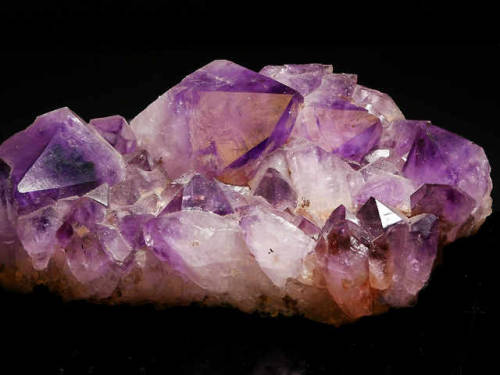 emeraldcityminerals:Large block of purple amethyst (SiO2) crystals. From Rio Grande do Sol, Brazil.