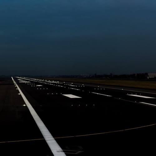 lairdkay:  Runway lights on for a twilight take off.
