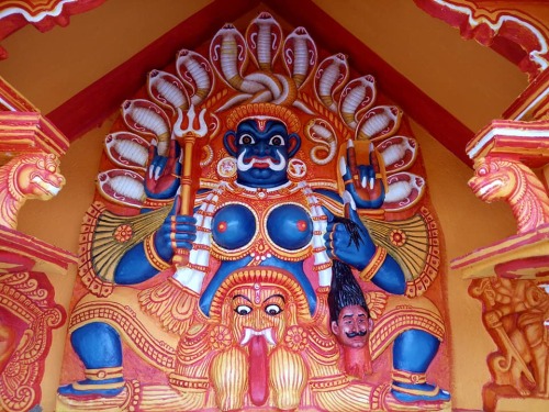 Bhadrakali at temple entrance, painting and photo by Tharun Vasudevan, Kerala