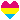 Pansexual pride flag in the shape of a heart.