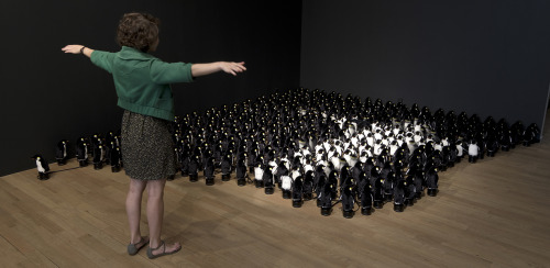 itscolossal:WATCH: An Interactive Mirror Built from 450 Rotating Penguins by Daniel Rozin 