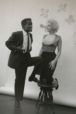 perfectlymarilynmonroe:  Marilyn Monroe and Sammy Davis Jr. photographed at Milton H. Greene’s studio in March, 1955. Milton was shooting her for a personal experiment when Davis Jr. arrived. He was recovering from a car accident, hence the the eye