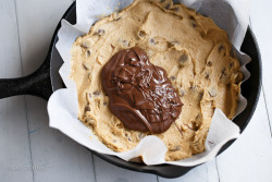 sweetoothgirl:Nutella Stuffed Deep Dish Chocolate Chip Skillet Cookie