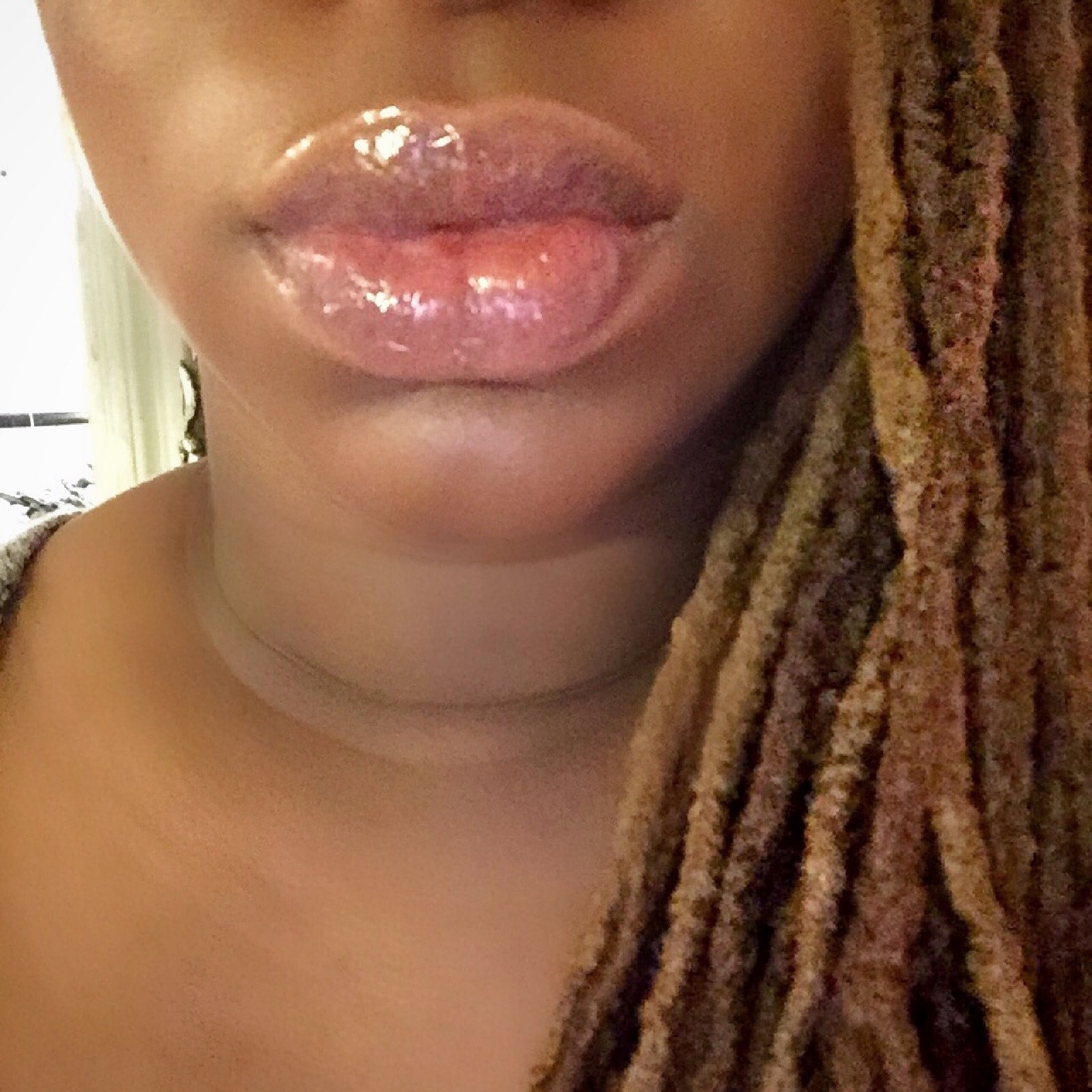 missprimproper:  A very shiny, lip glossy kiss to you all. Happy New Year!