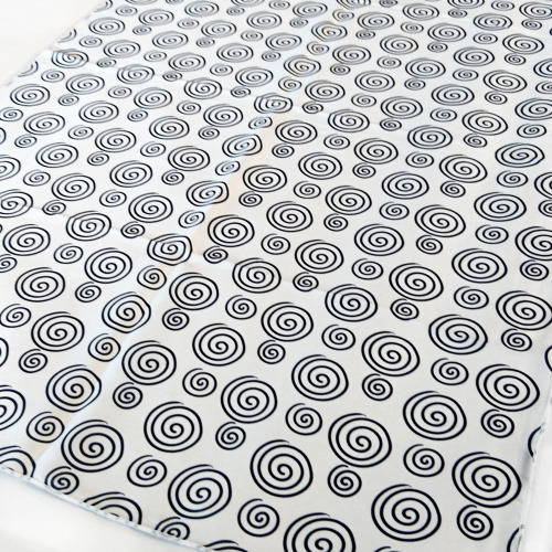 Black spiral pattern indelibly printed at white background, bold and clear, in high contrast design.