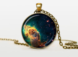 culturenlifestyle:Nebula and Galaxy Inspired Pendants Texas-based shop ThePendantIsland constructs handmade vintage pendants (previously featured here), which pay homage to a variety of themes, including astrophotography. The otherworldly pendants feature