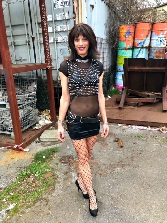 marleensommer:  June 2019 …At the entry to another party .. I decided for a consequently black/silver outfit - and bare skin. The trashy background adds the color ..  Yes