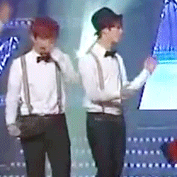 telekineticfrost:  Xiuhan sticking together during Show Champ encore ♥   I think is luhan sticking I xiumin keke