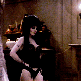 ghoulishpumpkinz:  My appearance is kind of a shock to everybody. Elvira: Mistress of the Dark (1988) 
