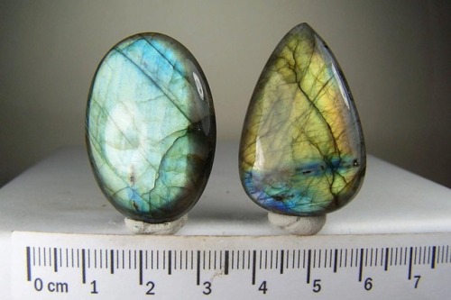 (2) Labradorite cabochons from Madagascar Starting bid is $15/3.7 x 2.4 x .8 cm/20.8 grams. Two drop