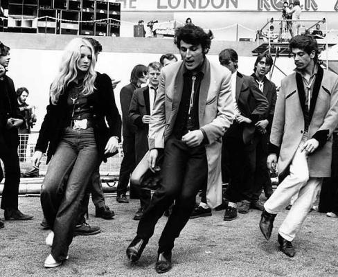 historicaltimes:  A group of teddy boys dancing at the London rock ‘n’ roll revival