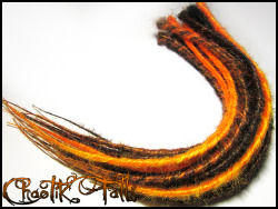 chaotikfalls:  NEW! For sale in my Etsy Shop. Halloween Inspired Synthetic Dreads.  20 Single Ended Synthetic Dreads. These are mostly blends except for 4 solid black. :) Colors: Black Grapefruit, Orange and Yellow. About 20” inches long. Click HERE