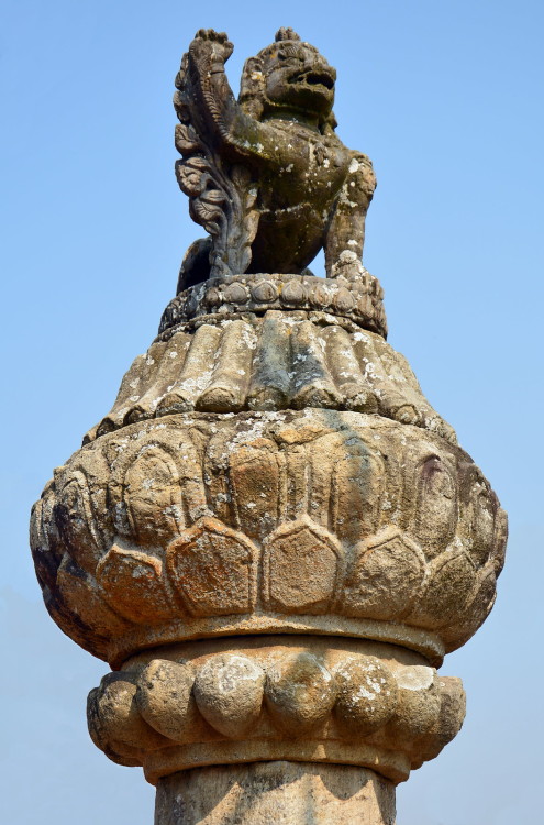 Statue of a lion, the goddess vehicle, in front of a temple dedicated to her, Nepal