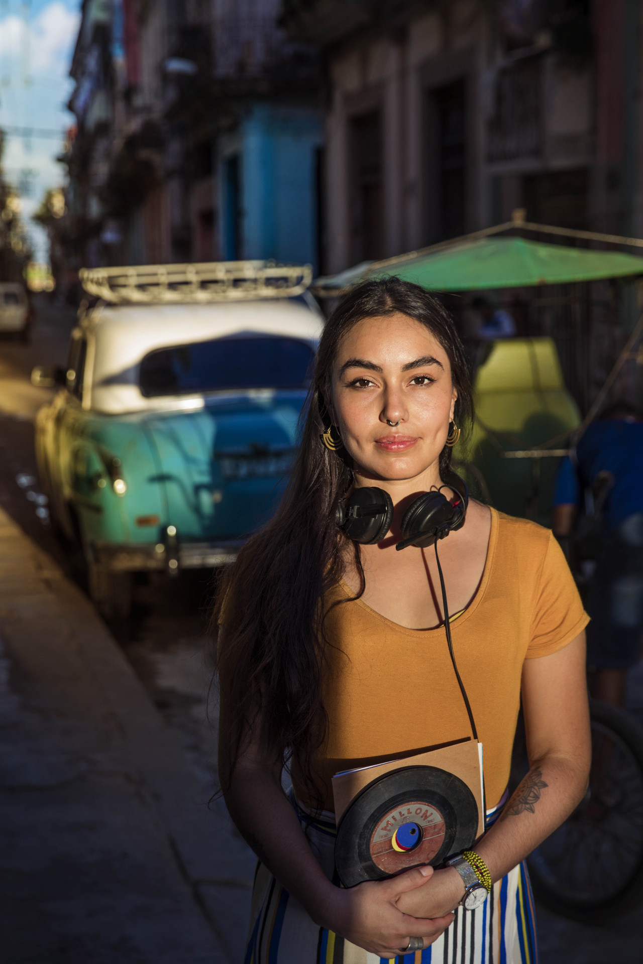 I took this photo a while ago, in Havana. Cami is more than a DJ. For many years she has been going from door to door, around Cuba, talking to people about the music they love and collecting old records from them. She has been mixing this music in...