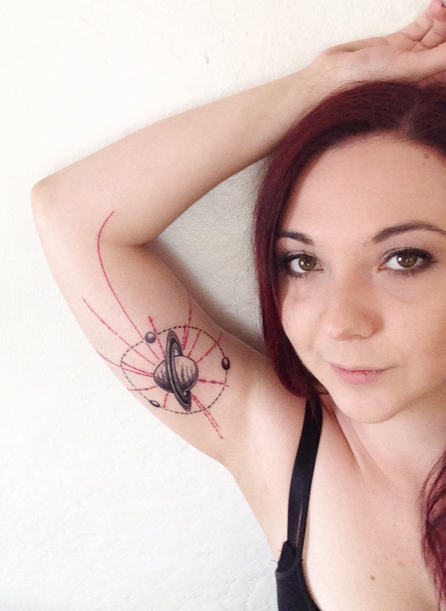 fuckyeahmathandsciencetattoos:  My Saturn tattoo with Titan, Iapetus, and Enceladus
