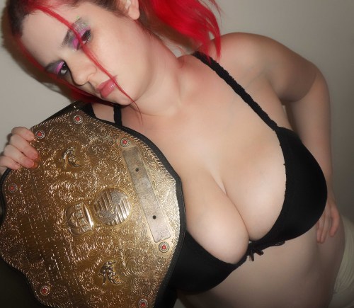 rebelfairy posing with a wrestling belt adult photos