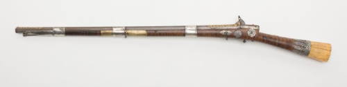 Ornate Turkish miquelet rifle decorated with gold, silver, and ivory.  Circa late 18th or early 19th