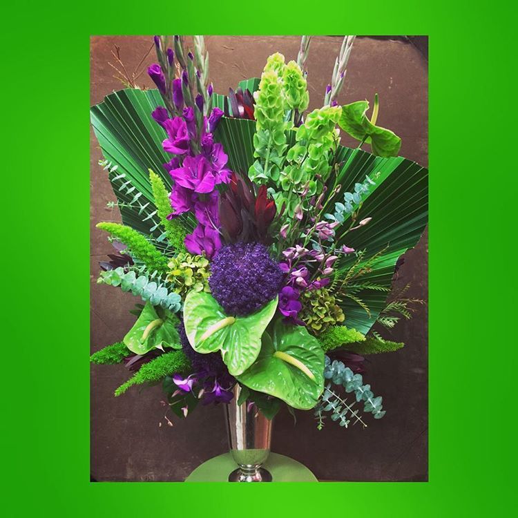 Cut Palm Fronds Are Combined With Purple Gladioli Tumbex
