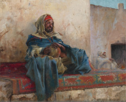 Charles James Theriat (American, 1860-1934), Playing the Derbake, Biskra. Oil on panel, 32.5 x 41.3 cm.