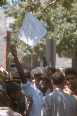 thefashioncomplex:Man holding up Black Power sign at Cicero March in Cicero, Illinois, Declan Haun, 1966