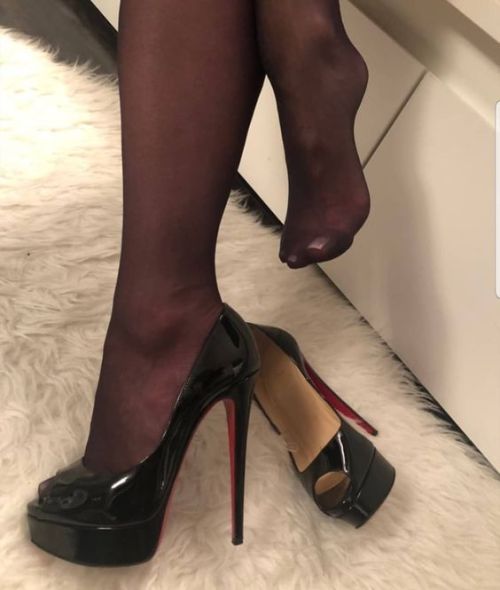 Black nylon and black heels