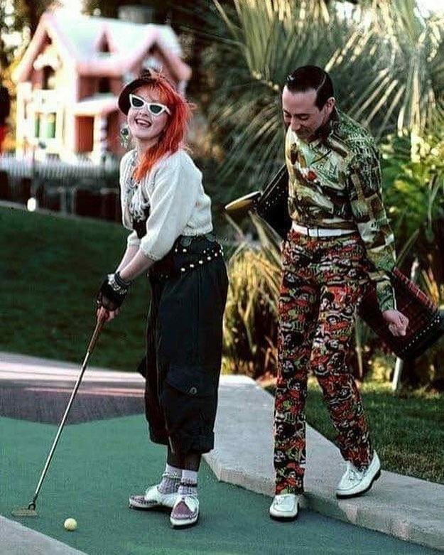 historium:Pee-wee Herman (Paul Reubens) and Cindi Lauper playing mini golf. 1988