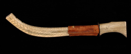 Inuit hunting knife with intricately scrimshawed caribou horn sheath, Northwest Territorry Canada, 1