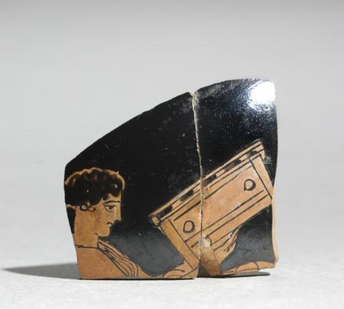 cma-greek-roman-art:Fragment of a Painted Vase: Maiden Carrying a Coffer, c. 430 BC, Cleveland Museu