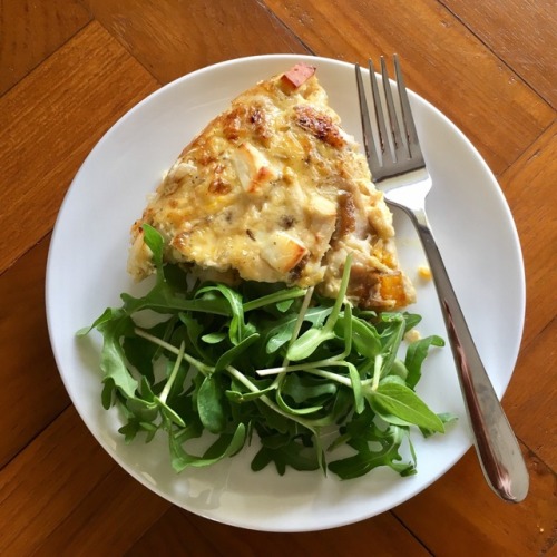 Frittata with roasted vegetables, chicken + halloumi, with rocket + sunflower sprouts