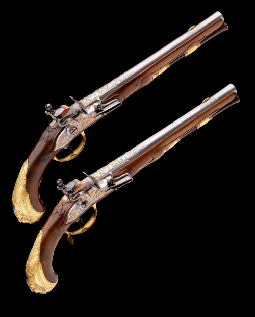 A lovely pair of flintlock pistols crafted by Jean Jacques Behr of Liege, Belgium, circa 1720-1730.