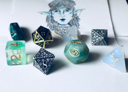 mollymavk: moon elf dice