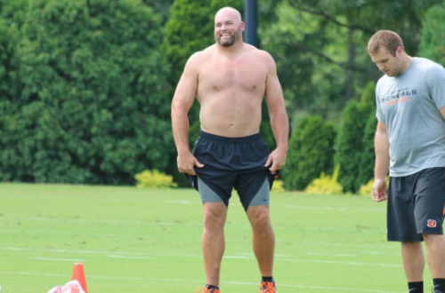 notdbd:  Andrew Whitworth is the big bald beautiful bare-assed player in the Cincinnati Bengals locker room. He played college football at LSU. His dark-haired naked teammate is Tyler Eifert. 