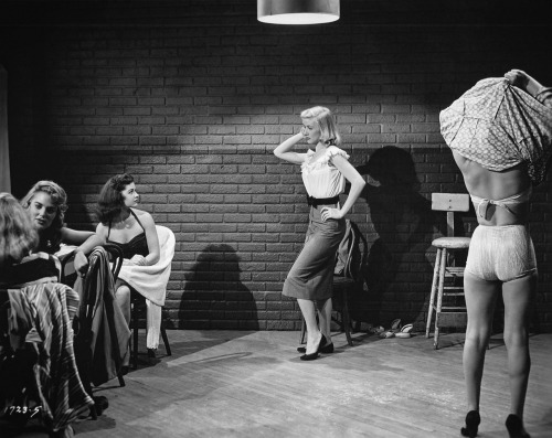 “Joyce Holden entertains her ‘sorority sisters’ in a lower East Side slum girls’ club in Girls in th