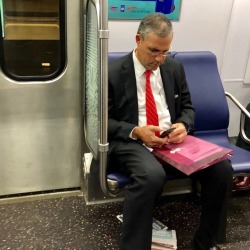 daddiesonthego:  Executive Red Tie Metro Daddy drafting an important email on his way home from a long and hard day at the office.