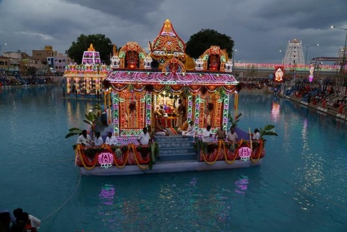 Krishna with Rukmini and Satyabhama at Thiruchanur theppotsavam, Tamil Nadu