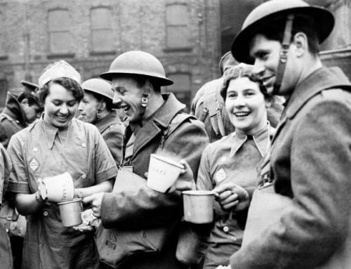 NAAFI girls greet American soldiers with hot coffee after theydisembark at a port in Northern Irelan