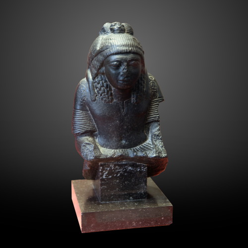 Ancient Egyptian basalt sculpture, depicting the god Thoth, in baboon form, protecting a general of 