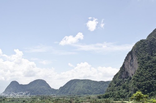 the-wanderlustproject:  These uniquely Malaysian hills and cliffs loomed the country.  Any big metropolitan city seemed to be a bunch of buildings and houses in the middle of a jungle.