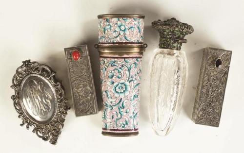 cair–paravel: Silver and enameled compacts and perfume bottles, 1900s.