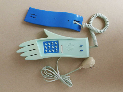 thegolddig:1980s Post Modern Hand-Shaped Landline(more information, more gold)