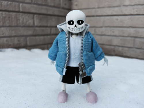 It Is A Picture Of Sans Doll Made By Me. I Made This Doll For Myself. It Is Just A Fan Art Doll. This