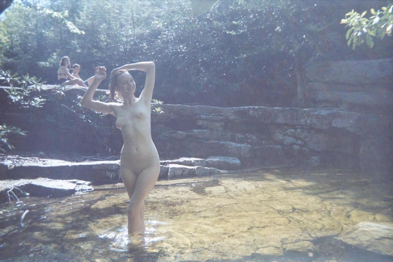 coconutdreamin:  ignoring the rest of the world35 mm disposable camera shot by Coyote