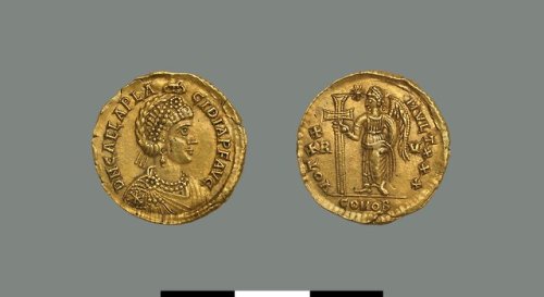 historyarchaeologyartefacts:A Roman Solidus coin bearing the likeness of Galla Placidia, the daughte