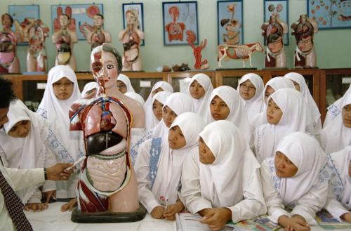 unearthedviews: INDONESIA. Solo. Female students attend a biology class in the Assalam pesantren.-Ab