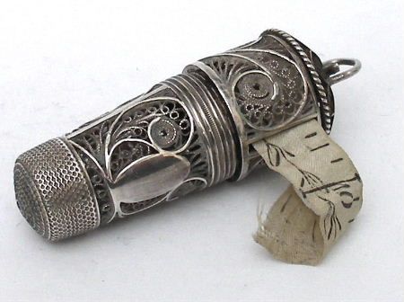 shewhoworshipscarlin: Tape measure, thimble, perfume bottle combo, 1895.